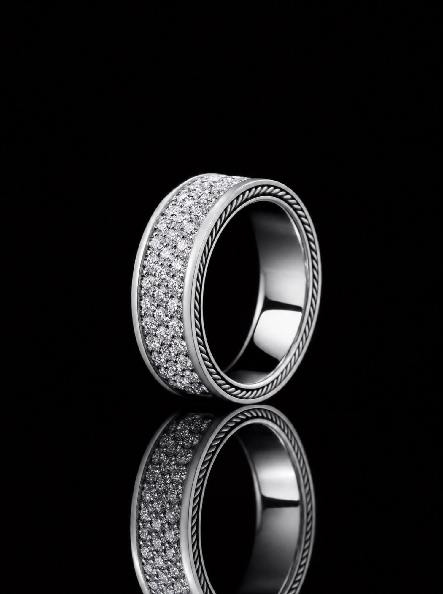 Bespoke men's jewellery commission being hand-finished at AXIOM
